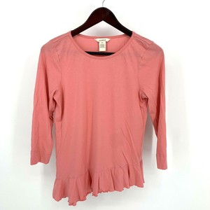 asymmetrical top with ruffles on the hem