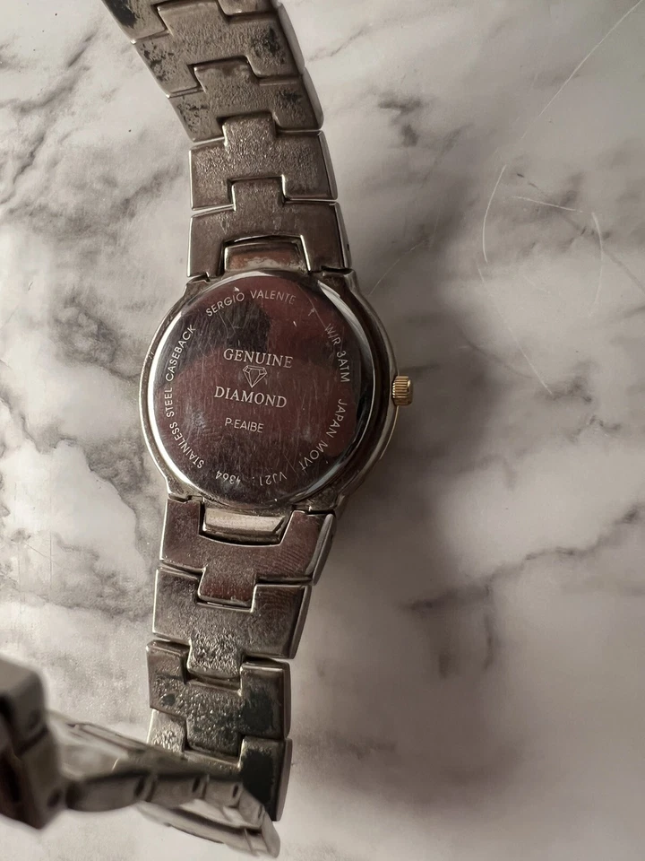 Женские кварцевые часы Sergio Valente с бриллиантами серебристые и золотистые - Изображение 3 из 4