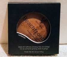 Bronceador Younique frente a la playa maquillaje hermosa cara verano brillo 0,2 oz 58 g