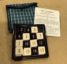 VTG c1950 15-PUZZLE RUDOLF STEINER CO TARTAN PLAID CASE SLIDING TILE GAME--RARE