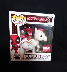 deadpool riding unicorn pop