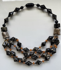 Collana ANGELA CAPUTI in resina nera oro arancione con perline