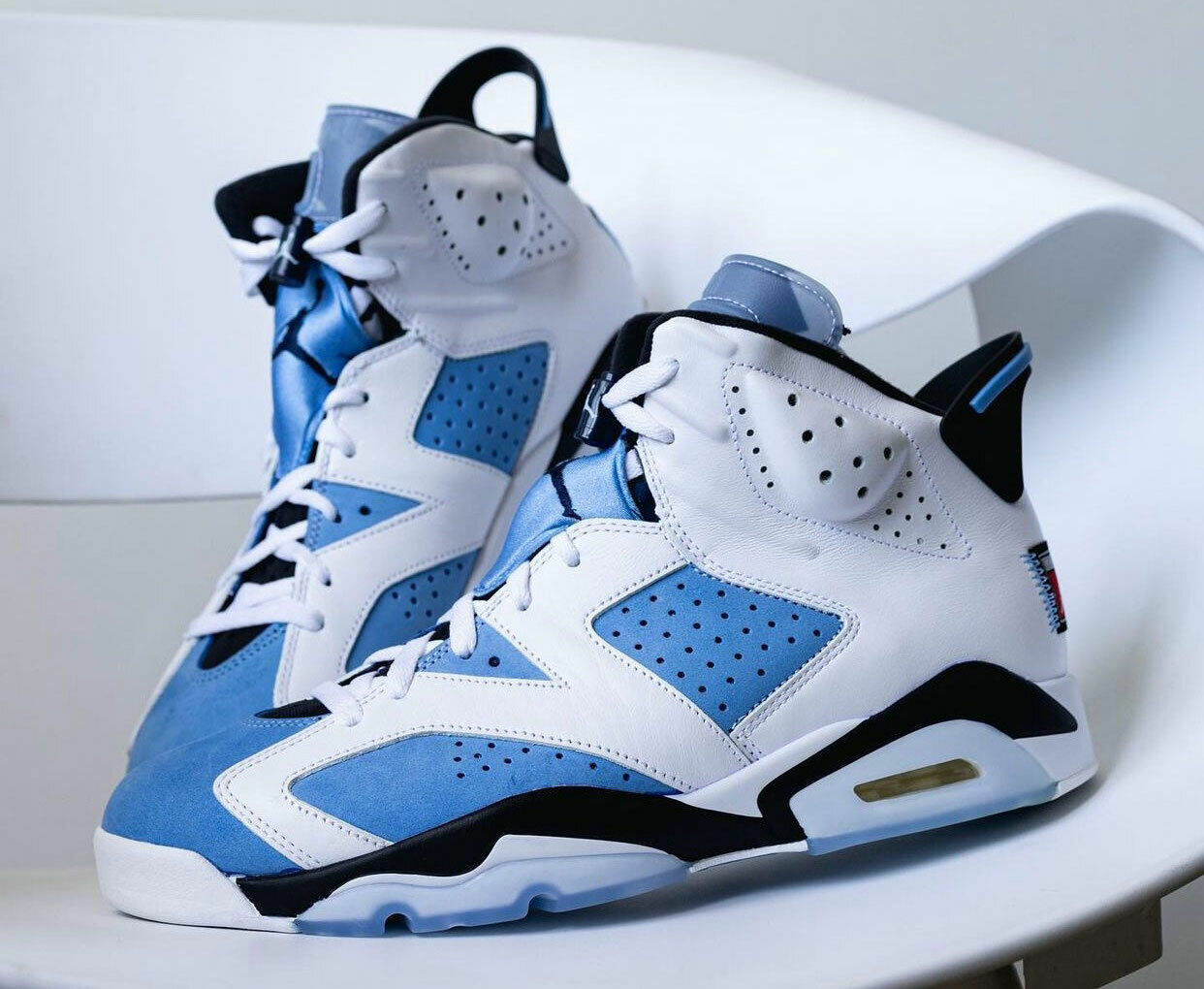 blue and white jordan 6's