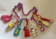 Vintage Plastic Bell Clip 23” Charm Necklace with 8 Charms 1980’s