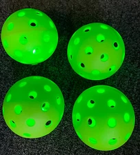 LED Pickleballs Box of 4, each with it's own battery , and lithium pin