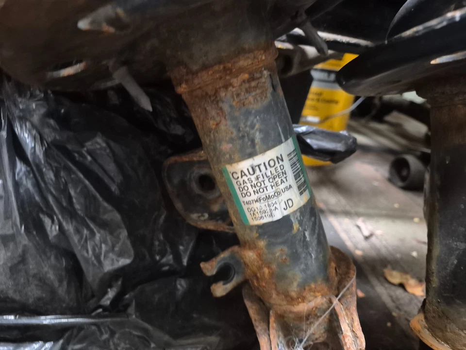 Conjunto de puntal delantero Ford Taurus 13-19 2,0 L 3,5 L lado L&R OEM DG1Z18124T Foto 2 de 4