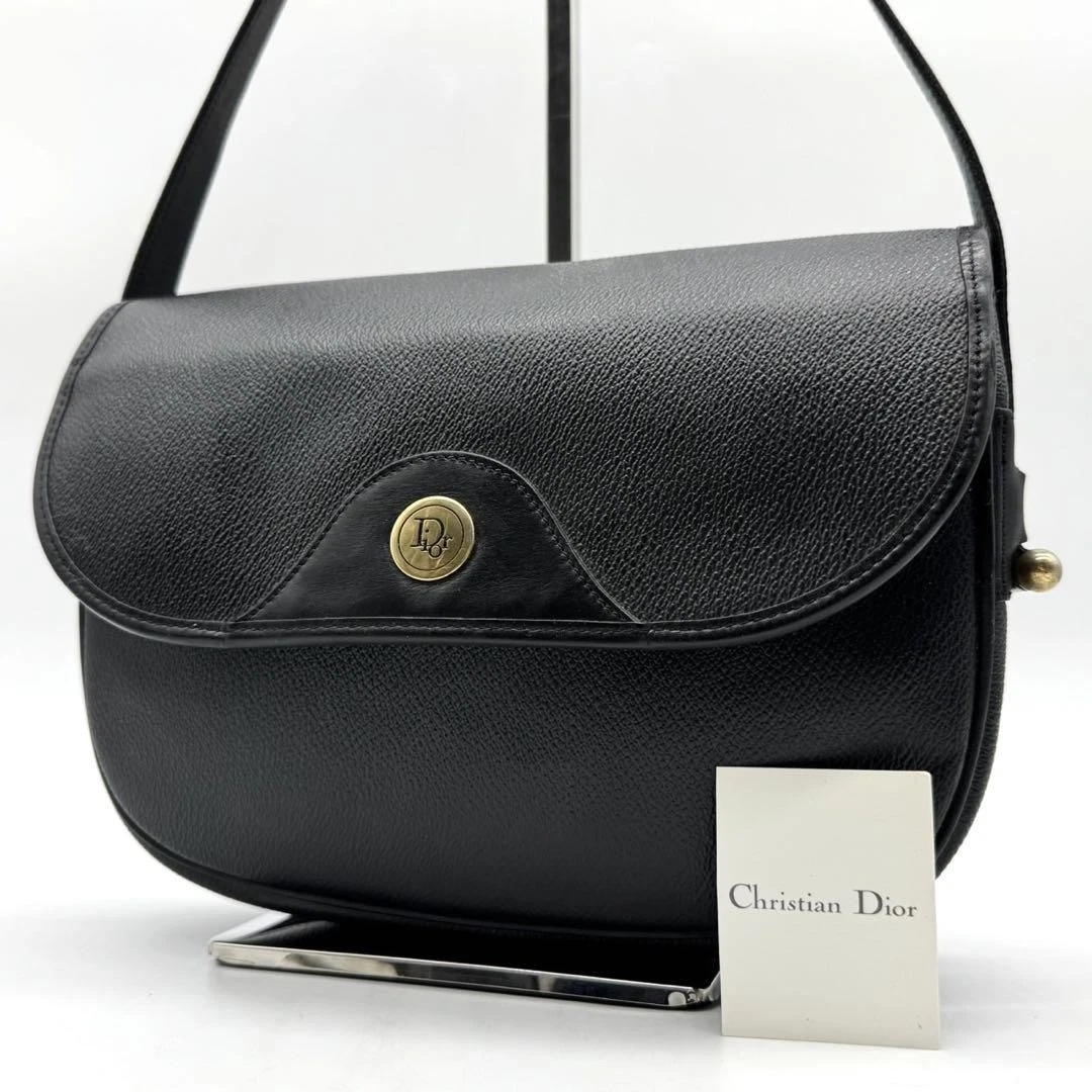 Sac bandoulière Christian Dior pochette logo quincaillerie dorée cuir noir