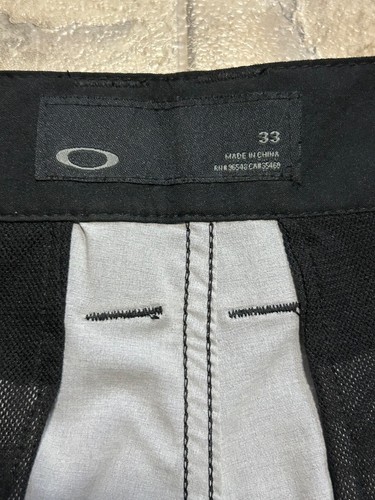 Pantalones cortos de golf Oakley Hybrid Performance para hombre talla 33 negros grises elásticos a cuadros - Imagen 9 de 17
