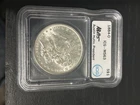 1884-O $1 Morgan Silver Dollar ICG MS-63 Austin Hutto Signed