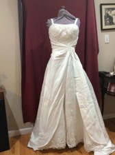 White wedding dress Polysatin w/chiffon insert. Pearl and sequin embroidery