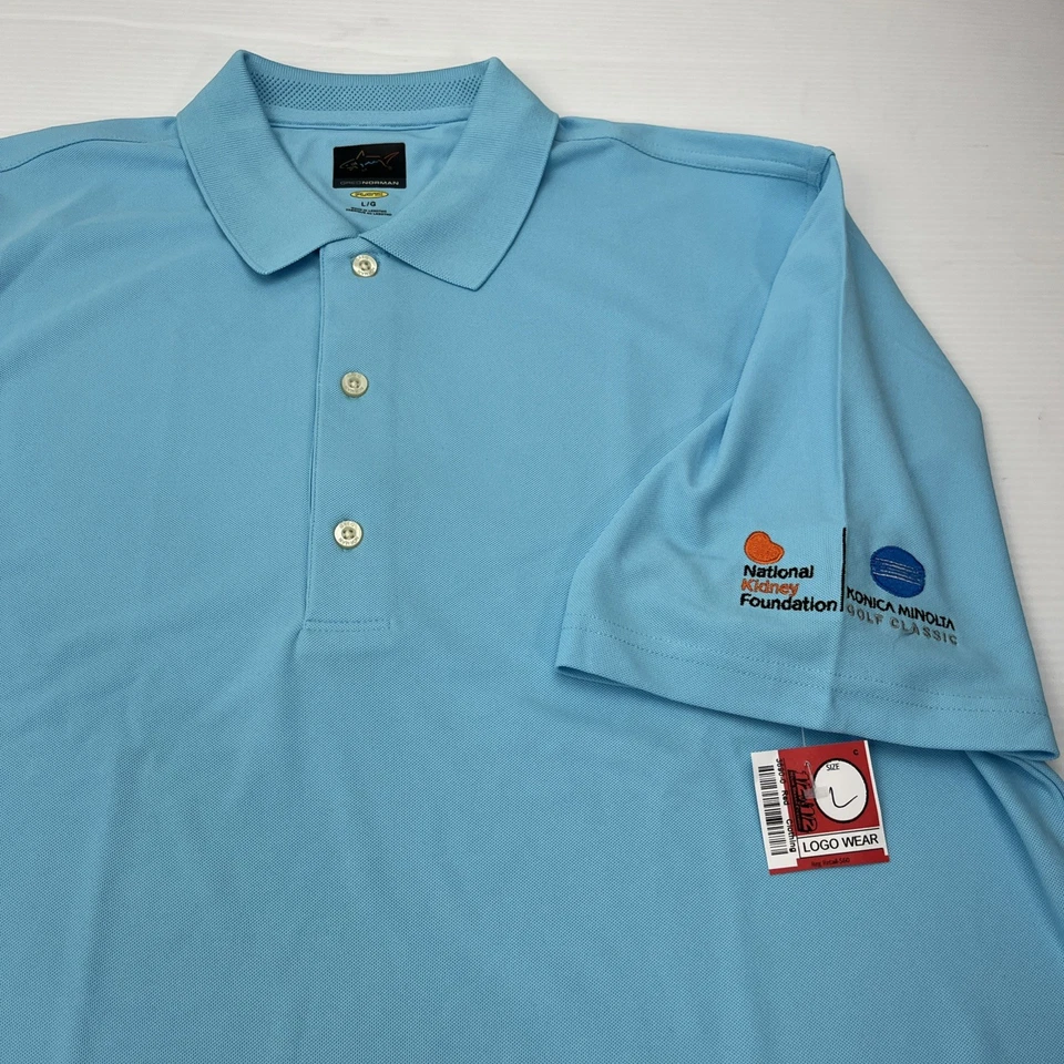 Polo Greg Norman Grande Azul Play Dry National Konica Minolta Golf Clásico Foto 2 de 4