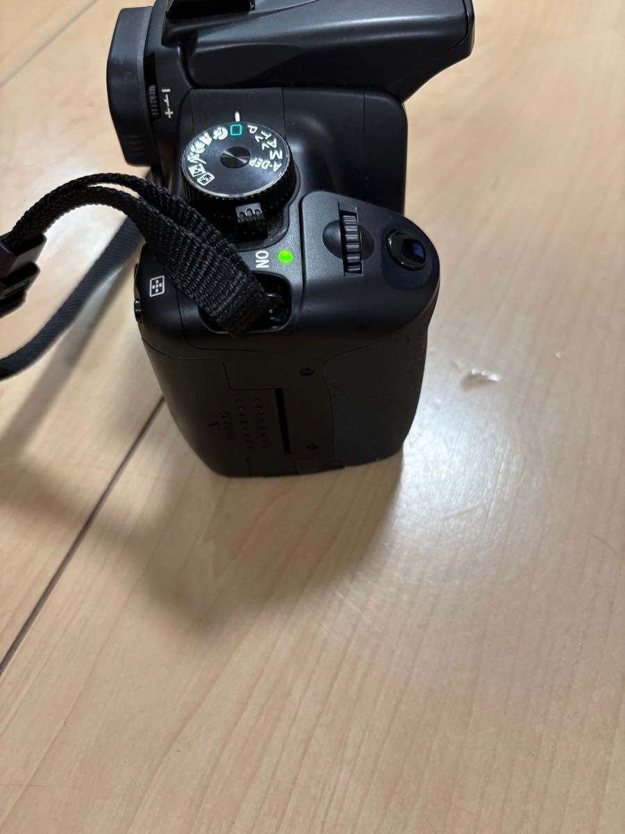 Canon EOS KISS DIGITAL X SLR camera With three zoom lenses