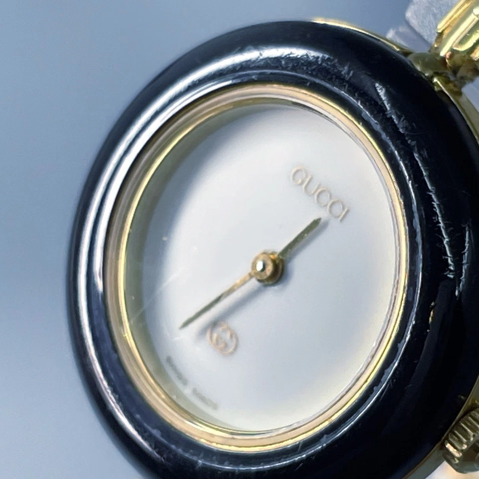 ▶️【Exc+5】 GUCCI Change Bisel 11/12 Esfera Blanca Dorado Negro Cuarzo Reloj para Mujer Foto 3 de 4
