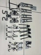 Assortment Rubbermaid Hooks for Wall Mounts.