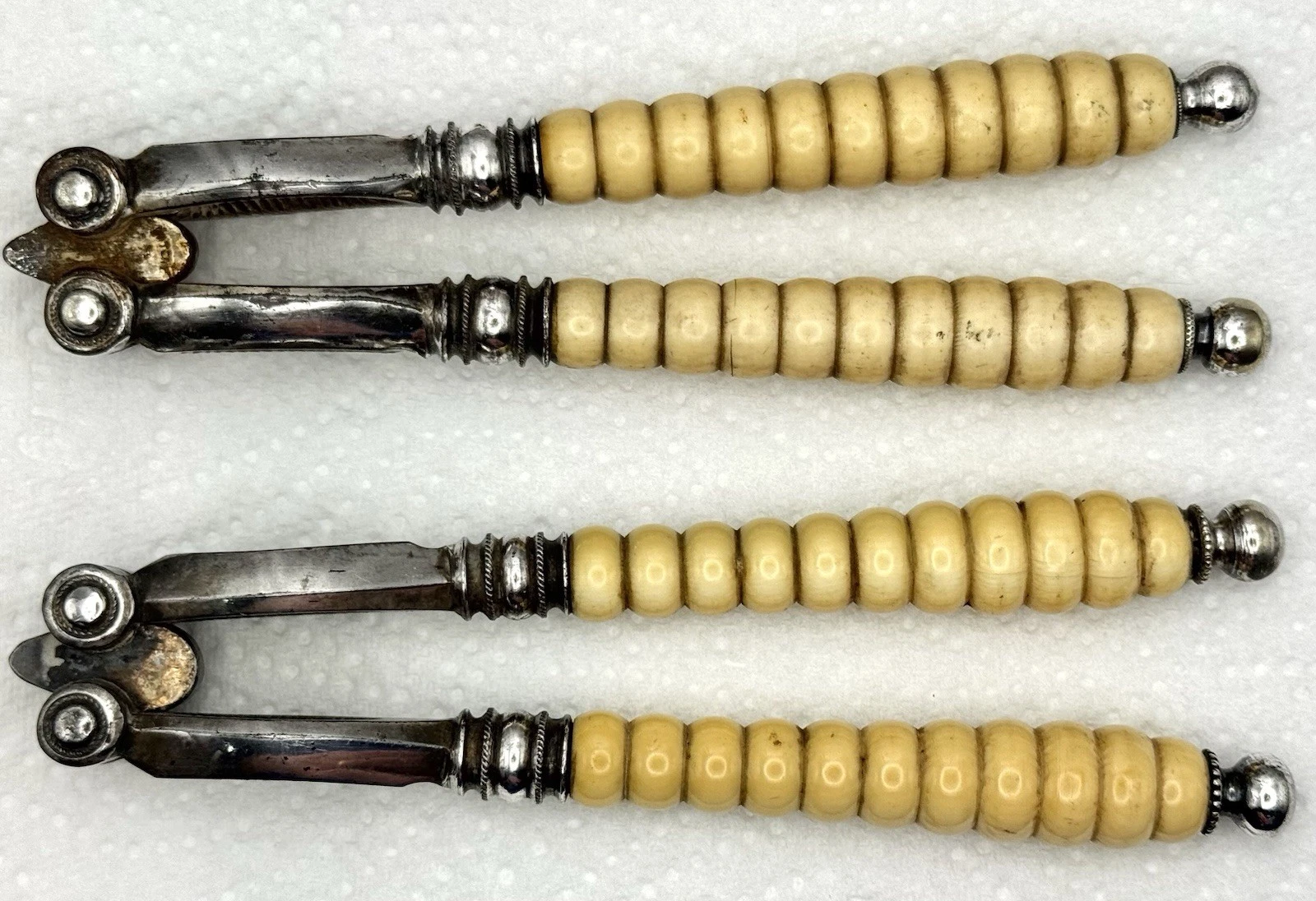 2 Sets of Antique Silver-Plated Nutcrackers 1875 - 1925 - Bone or Bakelite ?