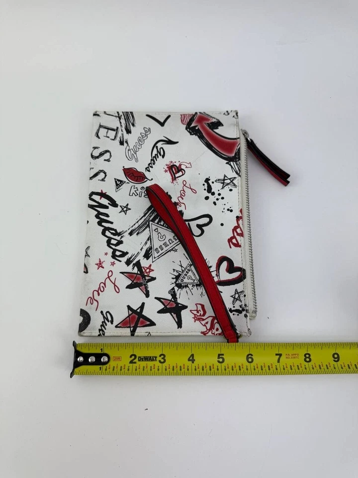 Muñequera Guess para mujer blanca con gráfico de grafito Foto 3 de 4