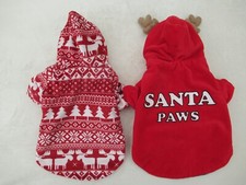 Two small Christmas Primark dog outfits