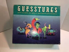 Guesstures: The Game of Split - Second Charades (1990, Milton Bradley (READ)