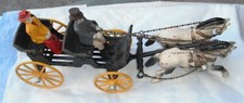 Cast Iron--Two Horse Drawn Wagon, driver, passenger..13" long---old er..