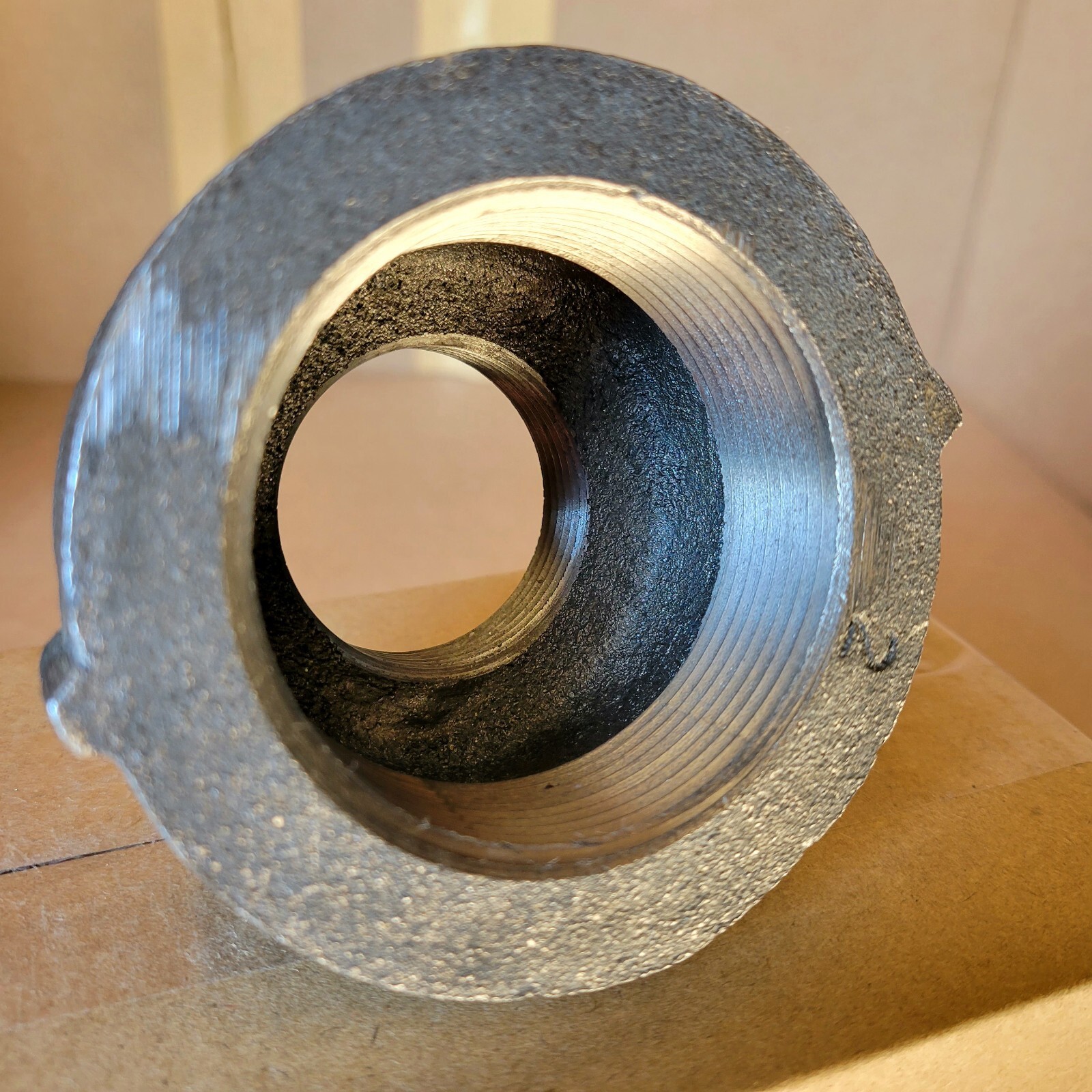 2" × 1 1/4" FEMALE REDUCER , ANVIL FEMALE BLACK CAST IRON CONCENTRIC REDUCER 