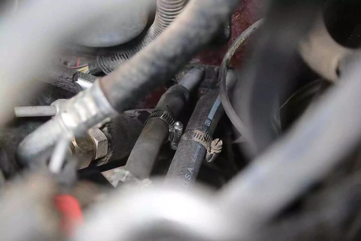 New hoses connected to the heater core.