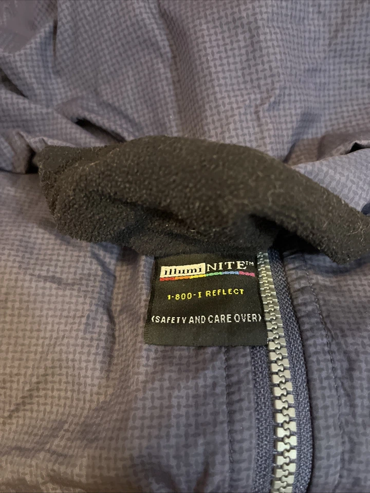 Chaleco de running Illuminite pequeño reflectante azul negro para hombre Foto 2 de 3