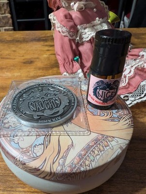 Black Phoenix Alchemy Lab Yules 2024 Nice Full Bottle And Naughty or Nice Coin