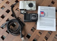 Ricoh Digitalkamera CX1 silber, gebraucht aus 2009 mit Zubehörpaket