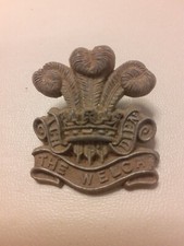 WWII British Army The Welch Regiment Plastic Economy Cap Badge