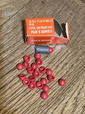 Vtg 2 pc cartridge case with 20 red plastic projectiles for capons