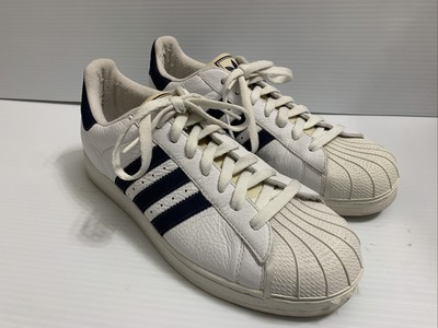 white and navy shell toe adidas