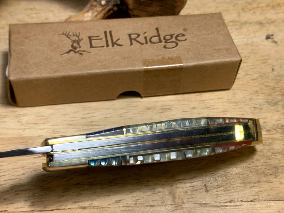 Navaja de bolsillo Elk Ridge roja, blanca y azul C-Tek Trapper 3 1/2" ER946 Foto 4 de 4