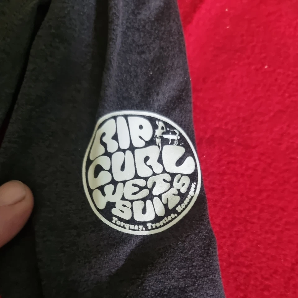 Rip Curl wet suits Gr.xs UPF 50+ Perf. Langarm Shirt / body anthrazit - Bild 3 von 4