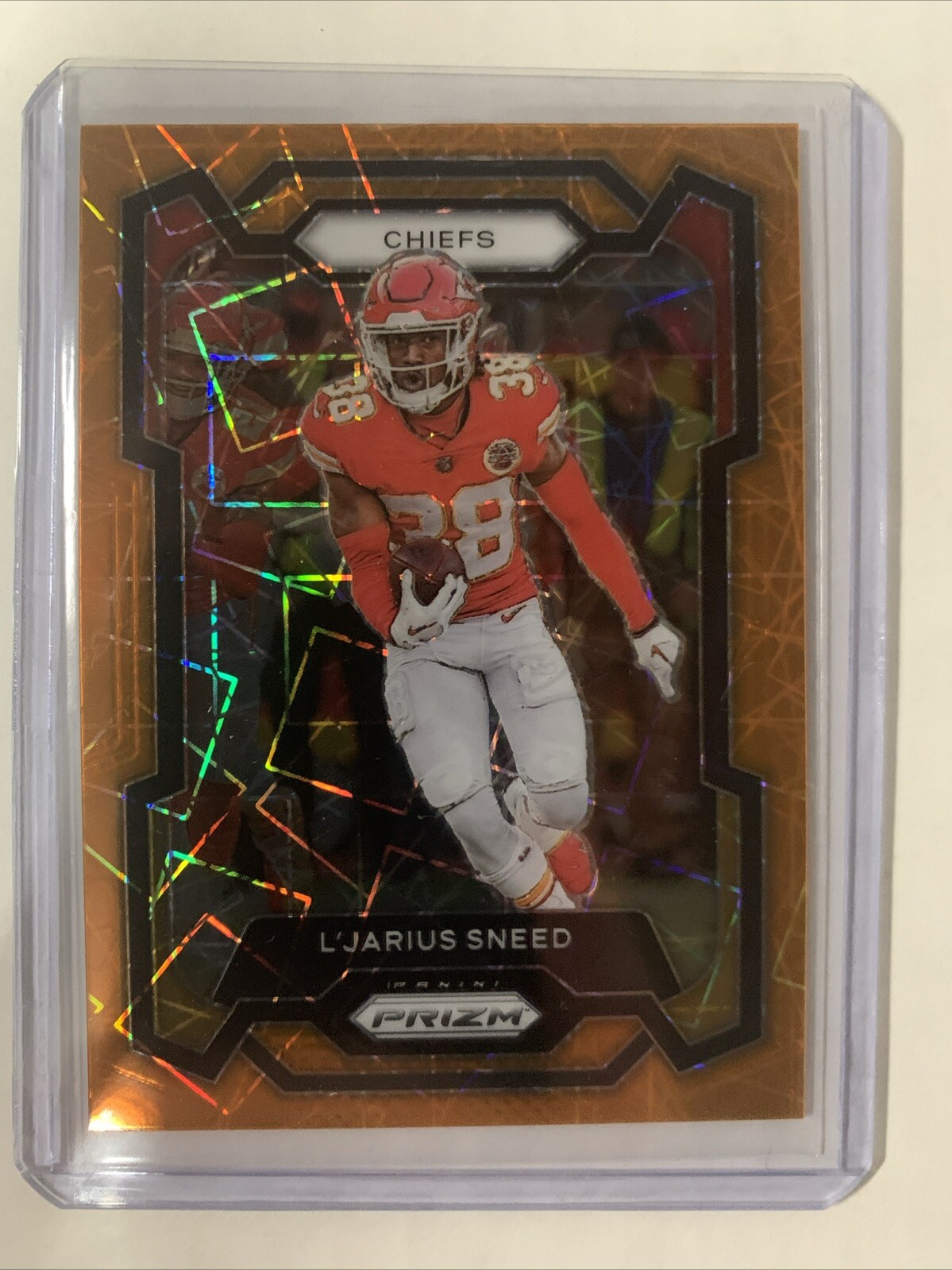 2023 Panini Prizm L'Jarius Sneed Orange Lazer Prizm Kansas City Chiefs