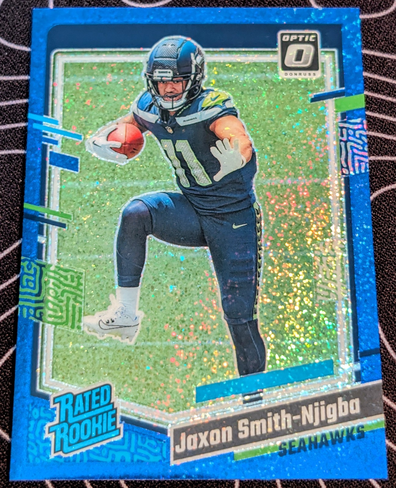2023 Optic Jaxon Smith-Jigba Blue Glitter Case Hit SSP rated rookie #293