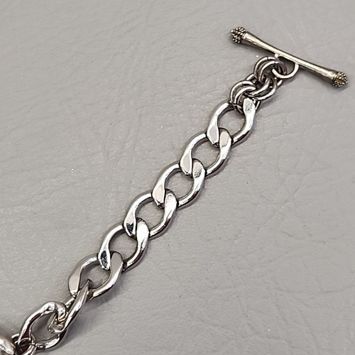 Pulsera de cadena Juicy Couture arco corazón cinta colgante tono plata bordillo 7" - Imagen 9 de 11
