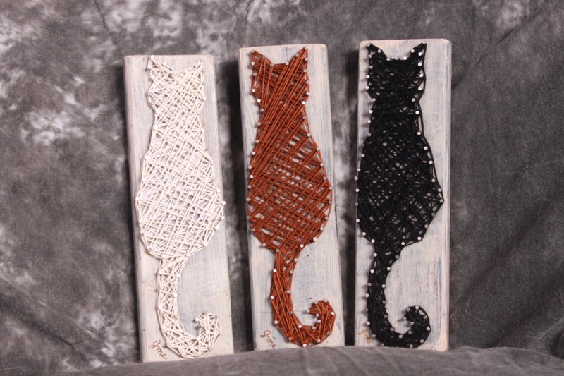 3 piece cat string art with a black, a white and a brown cat 8.5" H x 2.5" W ea.