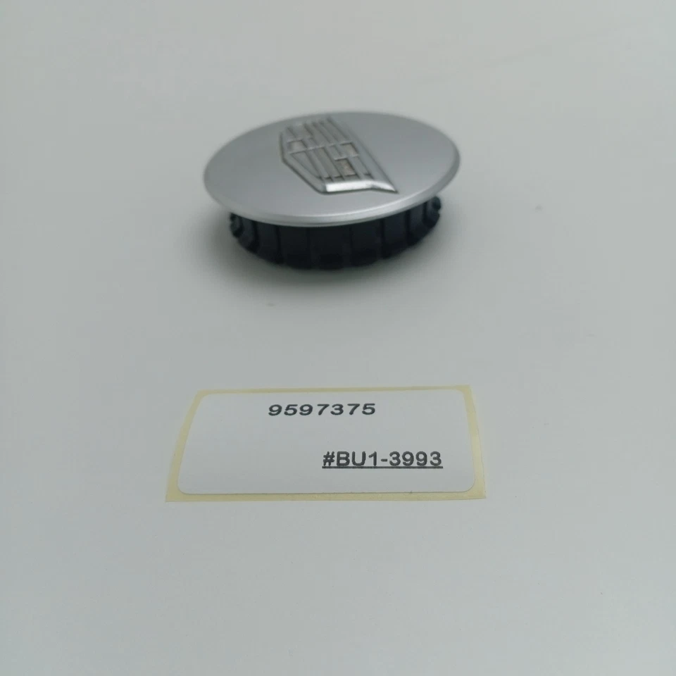 Cadillac ATS 2013-2017 tapa central plateada 9597375 Foto 3 de 4