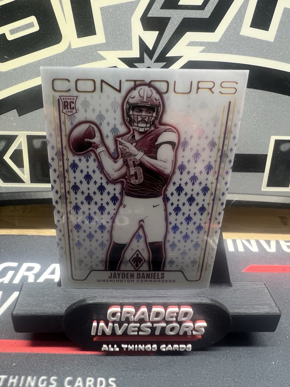 2024 Panini Phoenix Jayden Daniels - Contours Blue /50 - Commanders (RC)