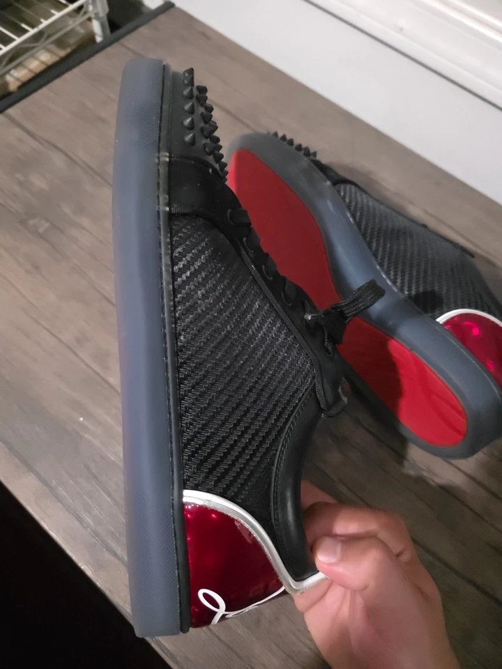 Zapatillas Christian Louboutin con fondo rojo negras Foto 2 de 4