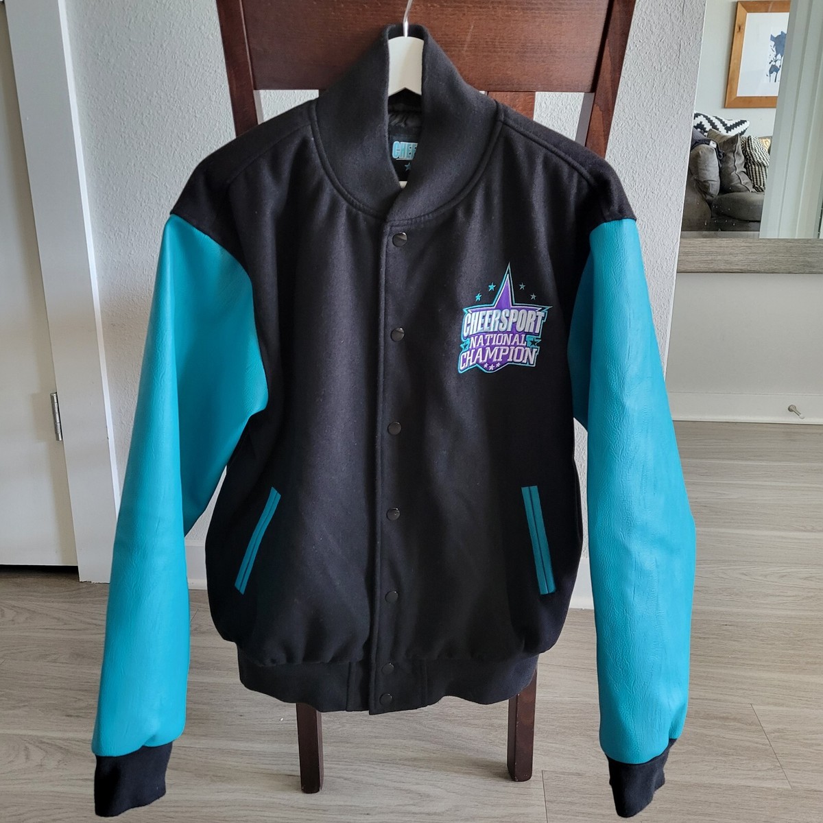 Cheersport National Champion Size L Black Turquoise Unisex Adult