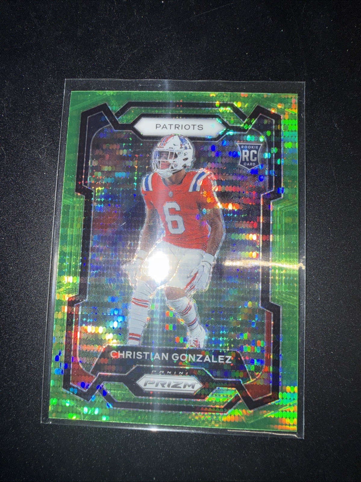 2023 Panini Prizm - Rookies Christian Gonzalez #369 Neon Green Pulsar Prizm (RC)