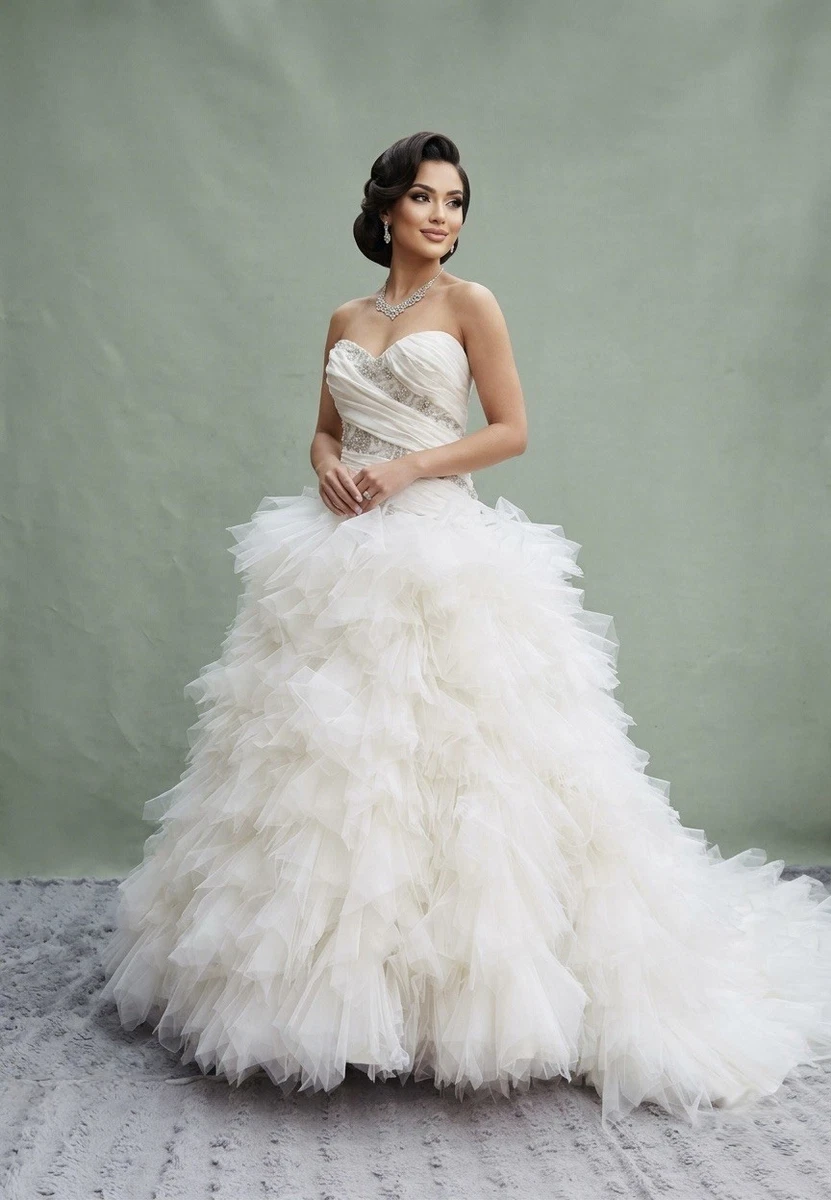 layered wedding dress uk Our Wren long-sleeve wedding dress is nothing short of iconic. That illusion cutout back? The double-layered bow? Pure statement. She's feminine, bold, and effortlessly chicno wonder brides can't get enough. Were you