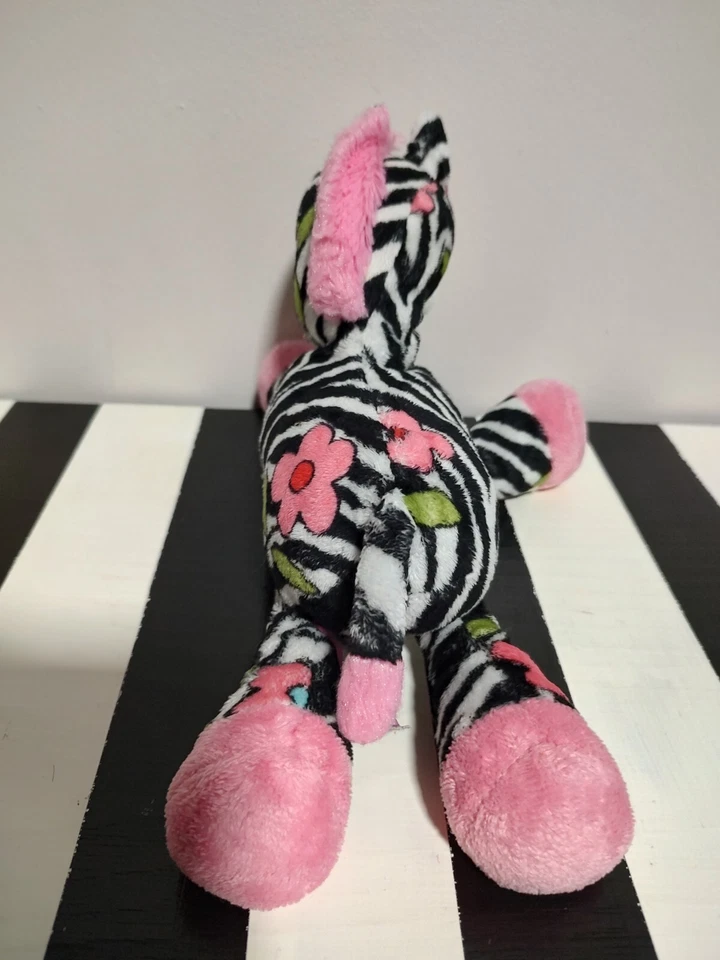 Juguete de peluche Douglas The Cuddle Rompecabezas Gabriella Cebra Rosa Flor Foto 3 de 4