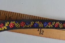 JACQUARD  FLORAL DESIGN  BRAID  TRIM  ON BLACK    3 YARDS X  1/2  INCHES WIDE