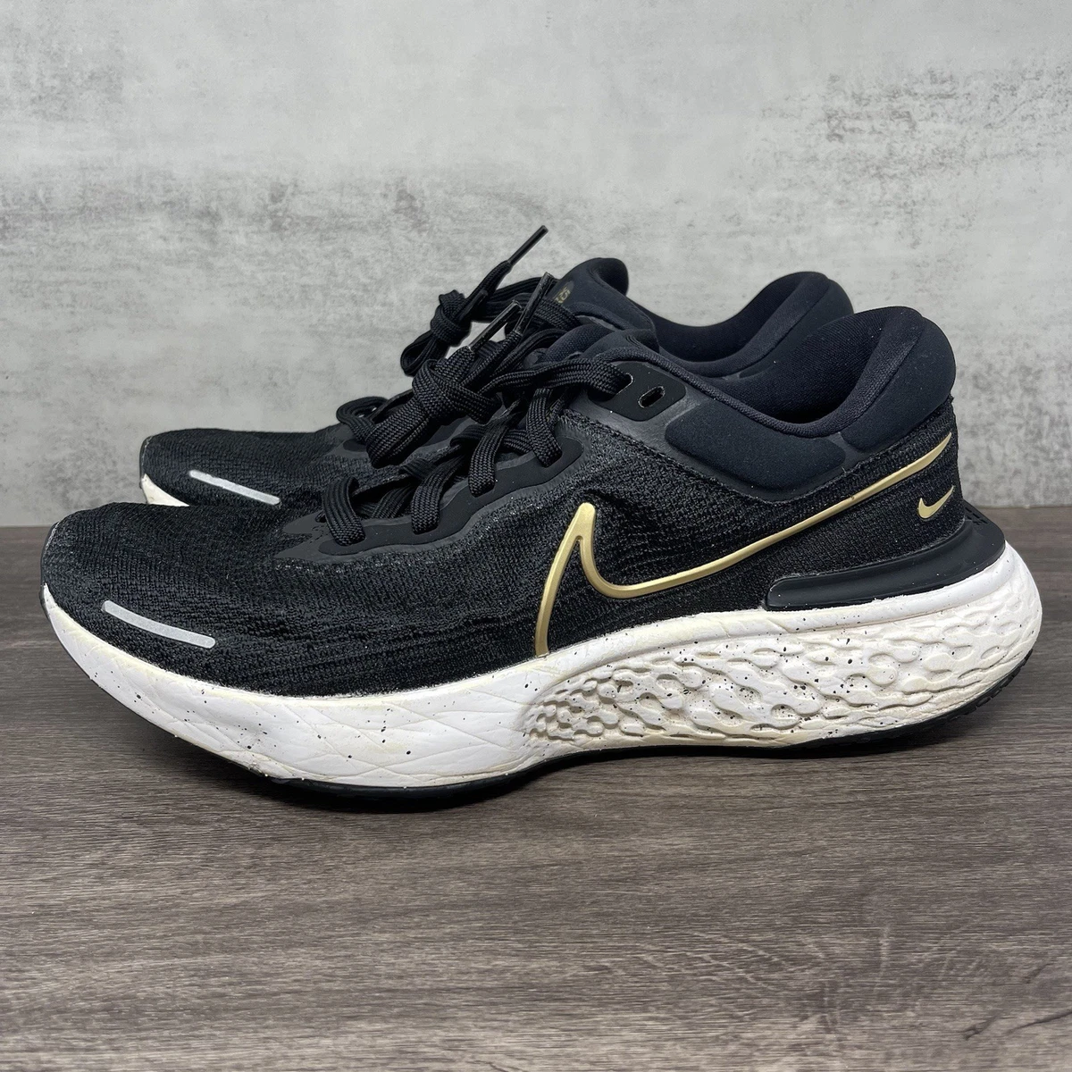 Nike ZoomX Invincible Run Flyknit Black Metallic Gold | eBay