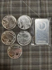 10oz Mixed Silver Lot .999 Fine.  5 Buffalo 1oz Round.  1 5oz Bar