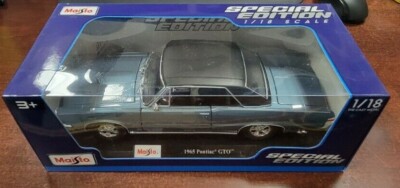 1965 Pontiac GTO ミニカー Maisto 1:18 s-l400.jpg