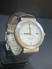 SEIKO V732 OP20 Quartz Watch – White Chrome Dial, ZRC Brown Leather Strap