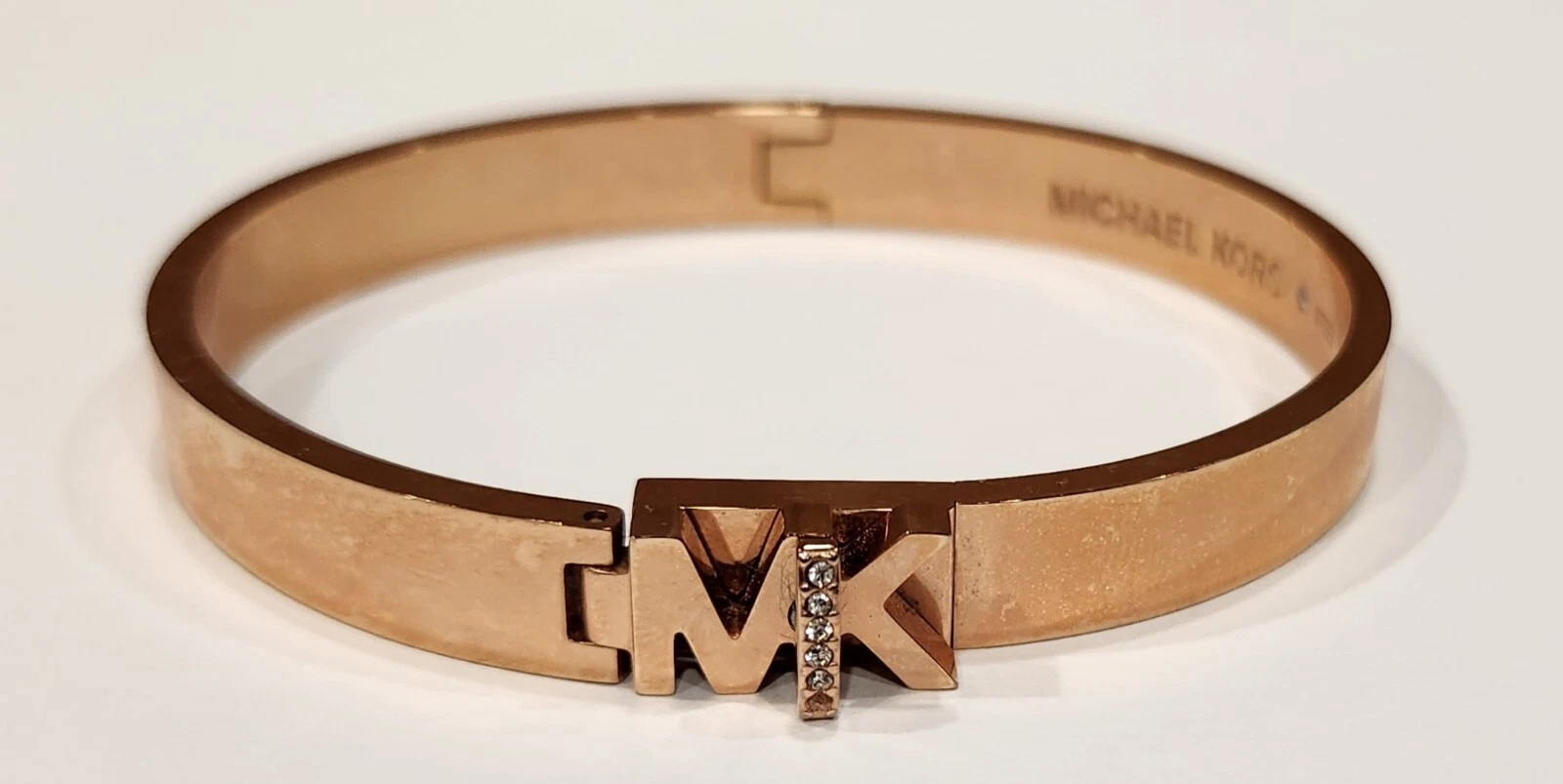 Bracciale Michael Kors oro rosa acciaio inox logo MK Turnlock MKJ7699